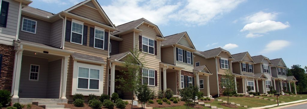 row of townhouses in suburban neighborhood